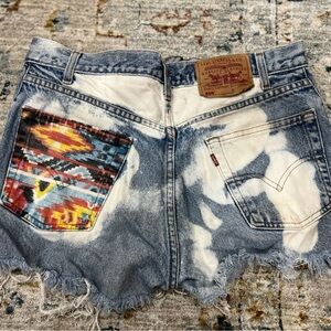 The Laundry Room bleached distressed Levi Jean shorts with Aztec pocket